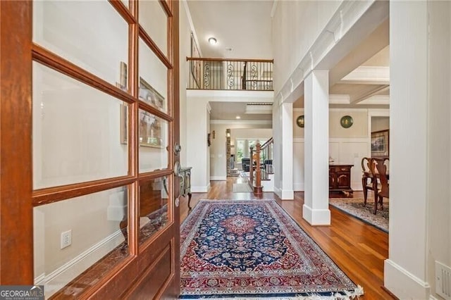 102 Townsend Pass, Alpharetta, GA 30004 - entryway with wood finished floors, crown molding, and a high ceiling