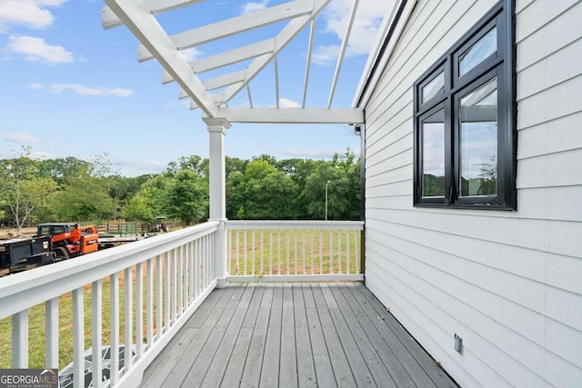 wooden deck with a pergola