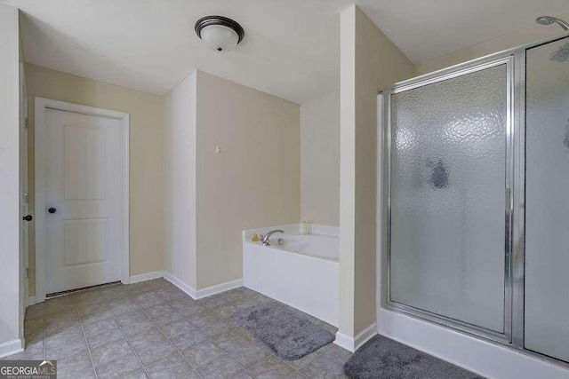 bathroom with tile patterned flooring and plus walk in shower