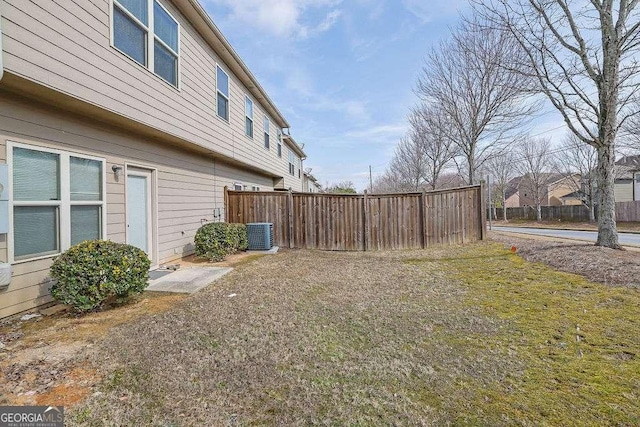 view of yard featuring central AC unit