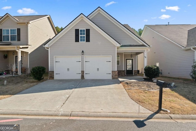 view of front facade with a garage and covered porch