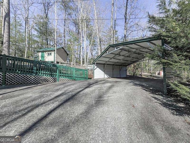 exterior space with a carport