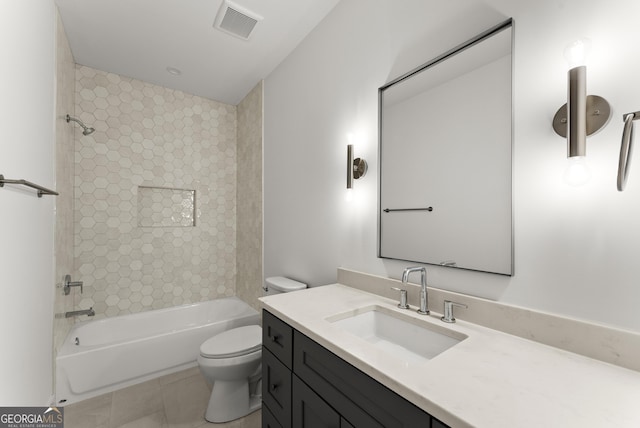 bathroom with toilet, shower / bath combination, vanity, visible vents, and tile patterned floors