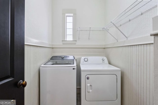 laundry room with separate washer and dryer