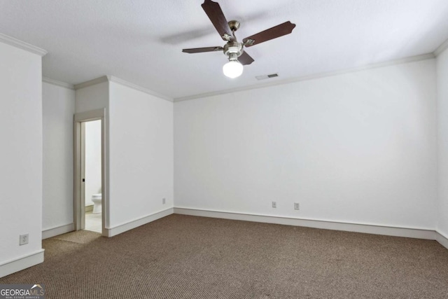 unfurnished room featuring crown molding, ceiling fan, and carpet floors