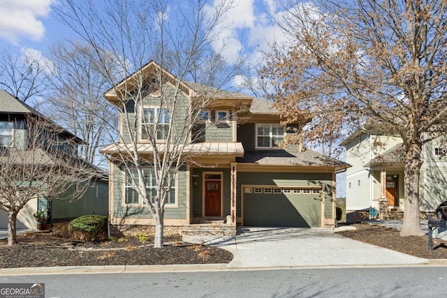 view of front of property featuring a garage