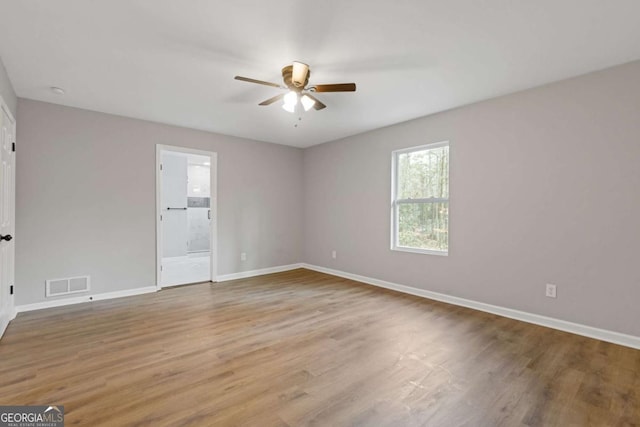 unfurnished room featuring wood-type flooring and ceiling fan