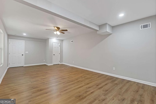 interior space featuring hardwood / wood-style flooring and ceiling fan