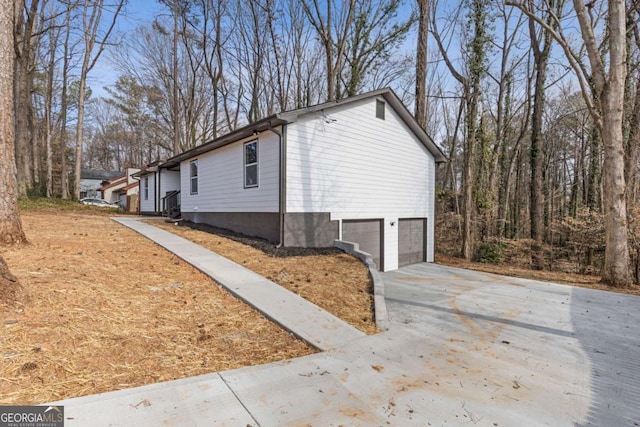 view of home's exterior featuring a garage