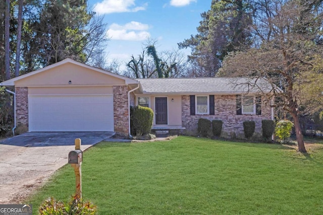 ranch-style home featuring a garage and a front yard