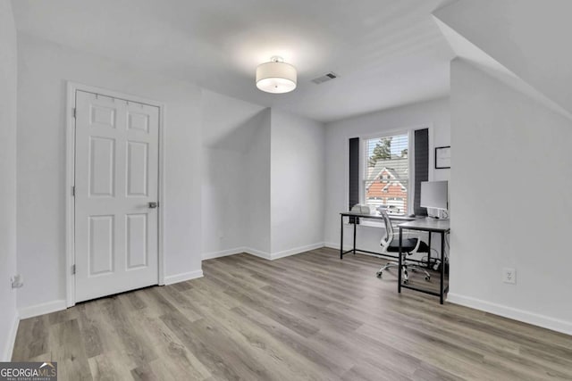 office area featuring light hardwood / wood-style flooring