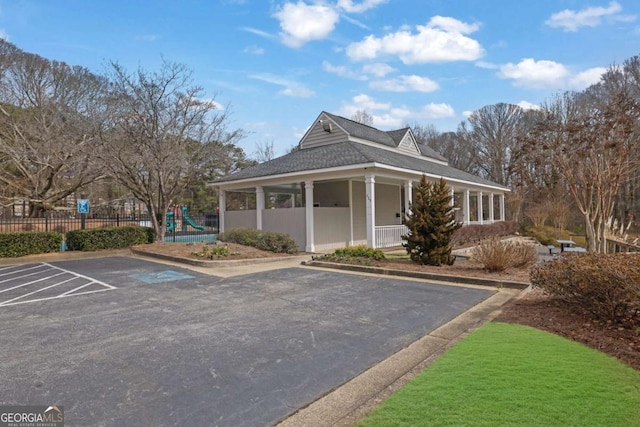 view of home's exterior with a playground