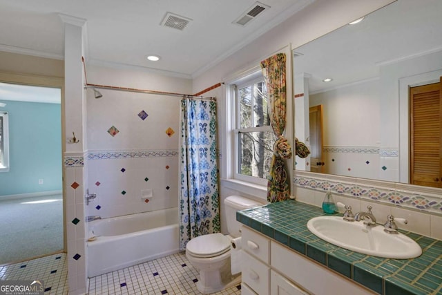 full bathroom with vanity, toilet, crown molding, tile patterned floors, and shower / bath combo with shower curtain