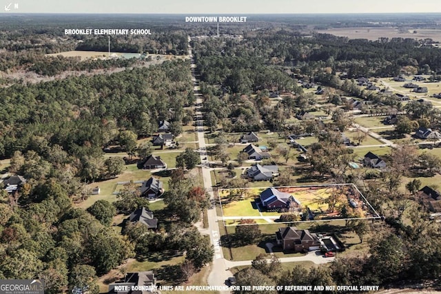 drone / aerial view with a forest view