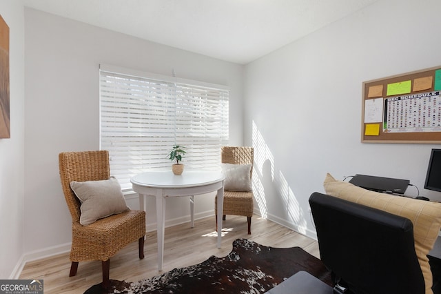 dining room featuring light hardwood / wood-style floors