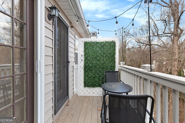 wooden balcony with a deck