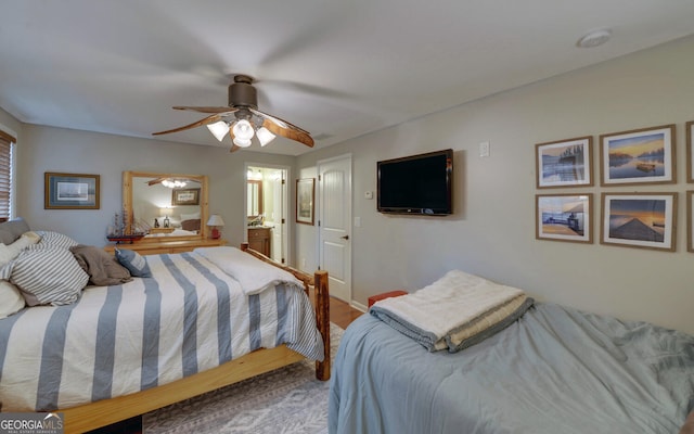 bedroom featuring connected bathroom and ceiling fan