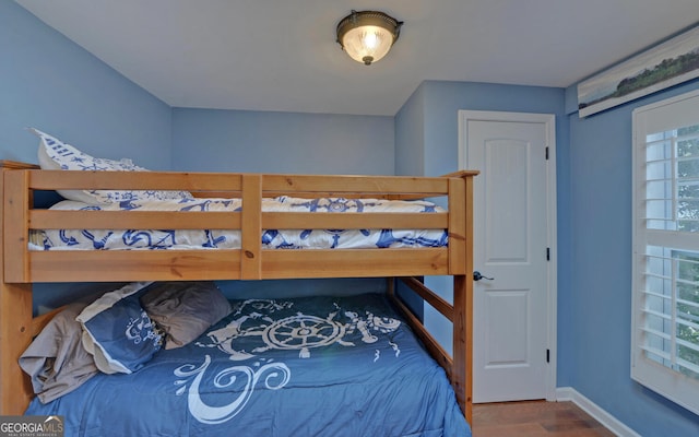 bedroom featuring wood-type flooring