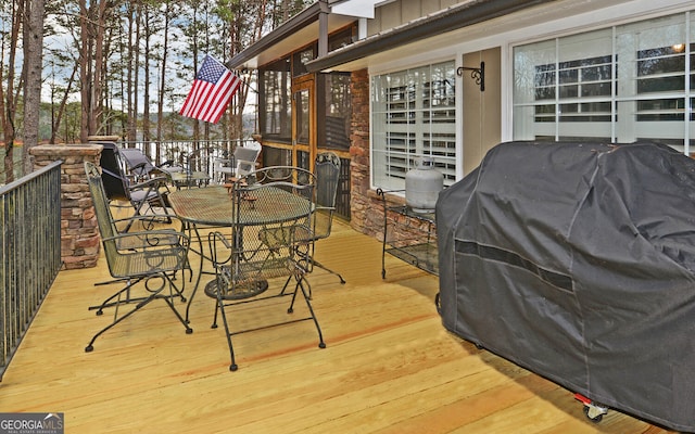 wooden terrace with grilling area