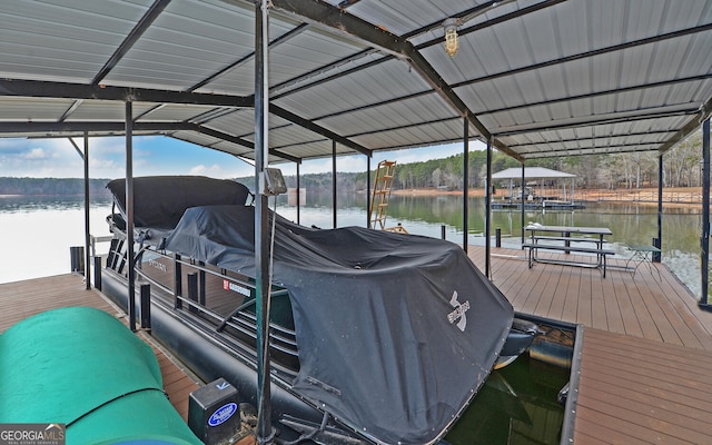 view of dock with a water view