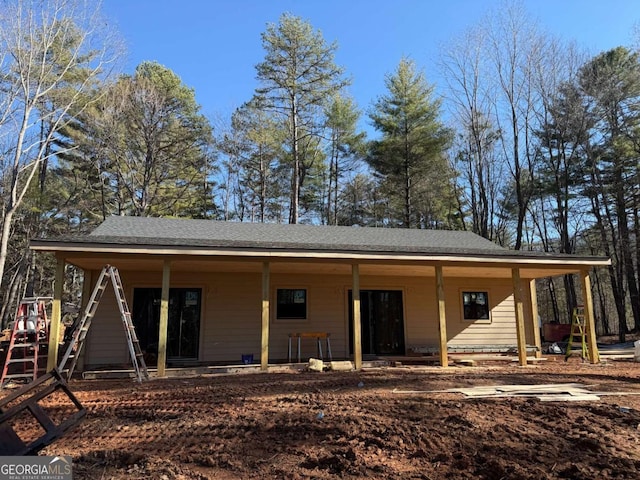 1117 Poor House Mountain Trl, Murphy, NC 28906 - back of property with covered porch and a shingled roof