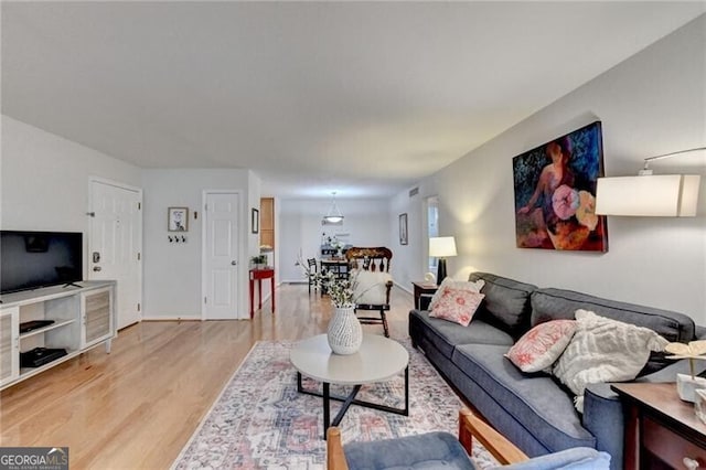 living room featuring light wood-type flooring