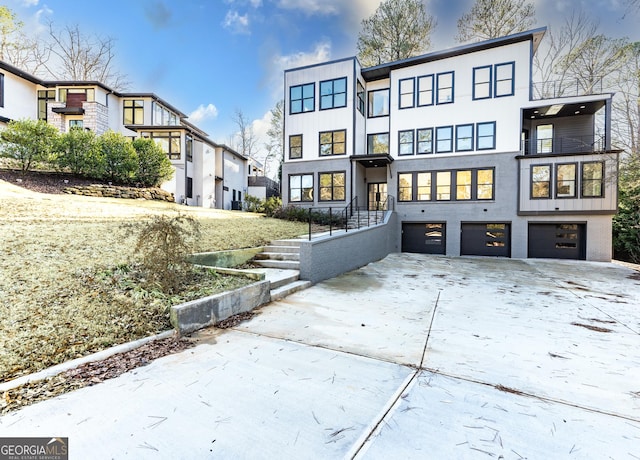 view of front of property with a garage