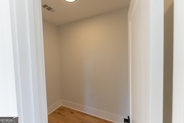 bathroom featuring wood-type flooring