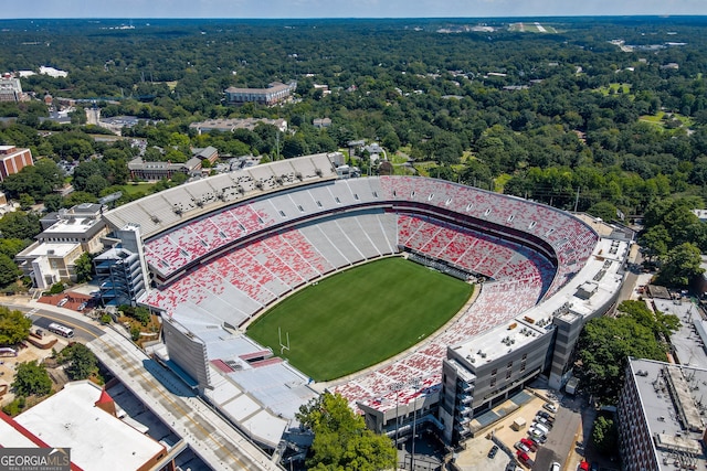 bird's eye view featuring a wooded view