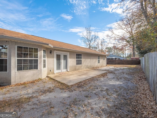 back of house featuring french doors and a patio area