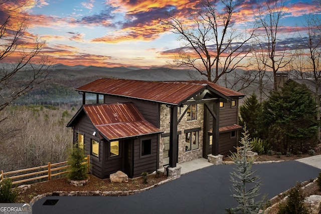 view of front of home featuring a mountain view