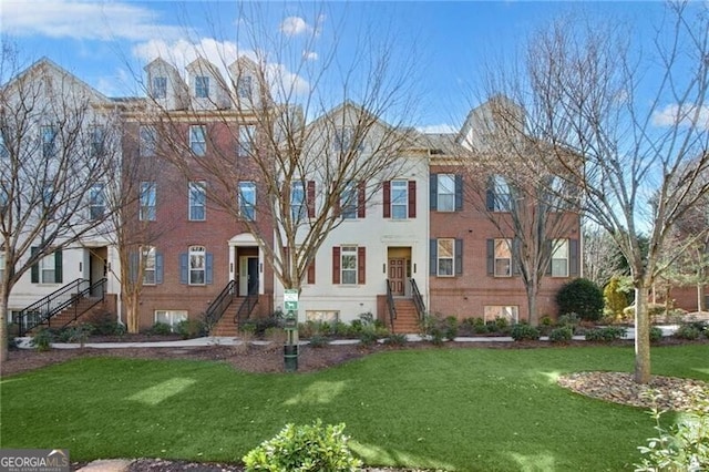 view of property with a front lawn