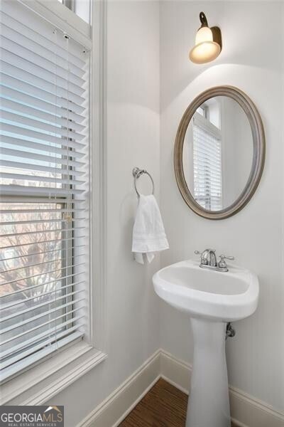 bathroom featuring hardwood / wood-style flooring