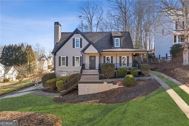 view of front of house featuring a porch and a front yard