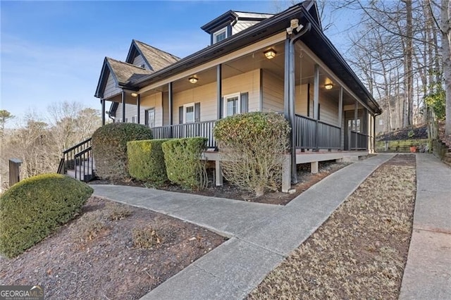 view of home's exterior featuring a porch