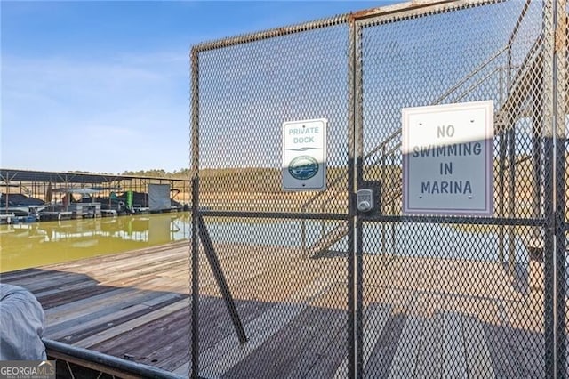 dock area with a water view