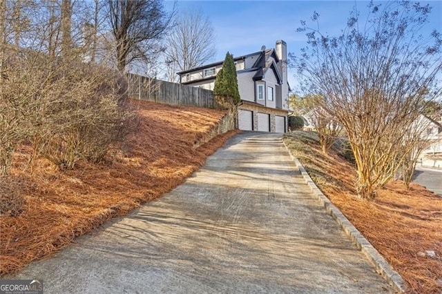 view of home's exterior featuring a garage