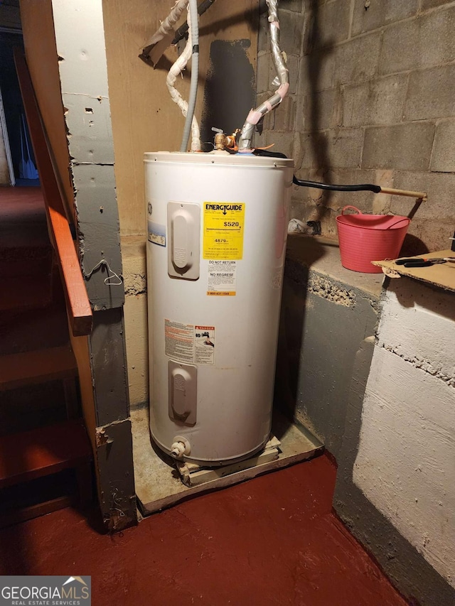 utility room with electric water heater