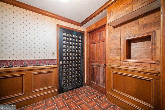 interior space featuring crown molding