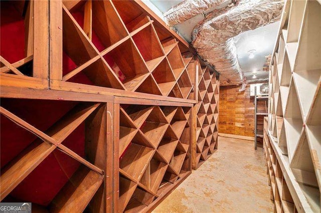 wine cellar featuring concrete flooring