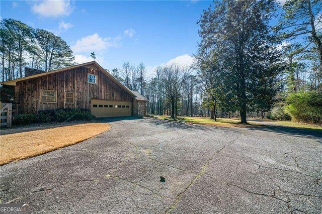 view of home's exterior with a garage