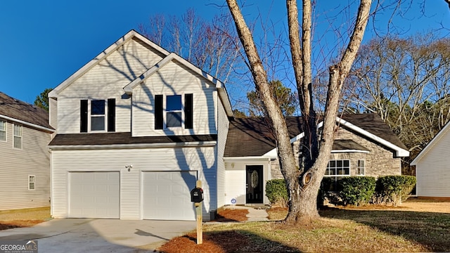 view of front property with a garage