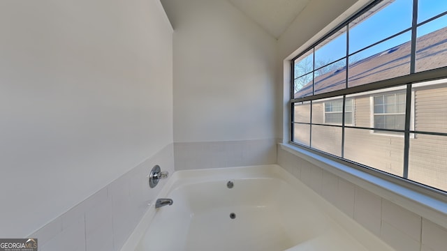 bathroom with a washtub