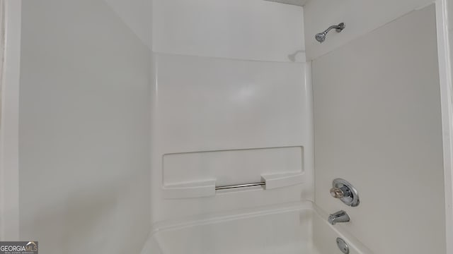 bathroom with shower / bath combination