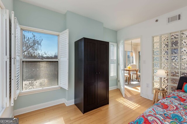 bedroom featuring light hardwood / wood-style floors