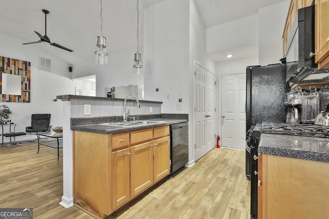 kitchen with sink, hanging light fixtures, ceiling fan, black appliances, and light wood-type flooring