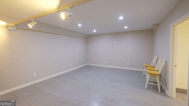 basement with rail lighting