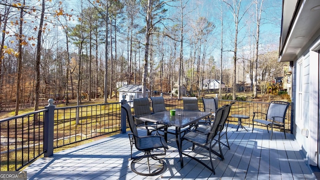 wooden deck with a storage unit