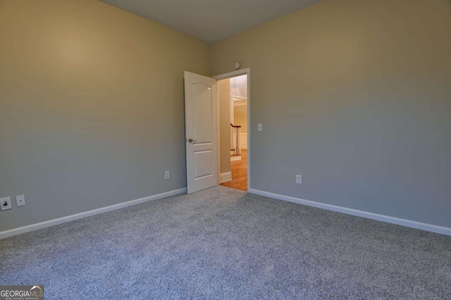 empty room with carpet floors