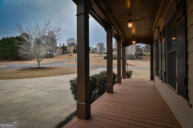 wooden terrace with covered porch